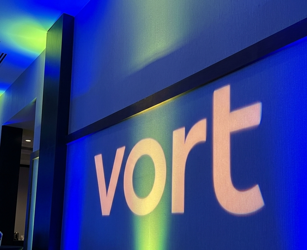 The Vort logo on display at a company event